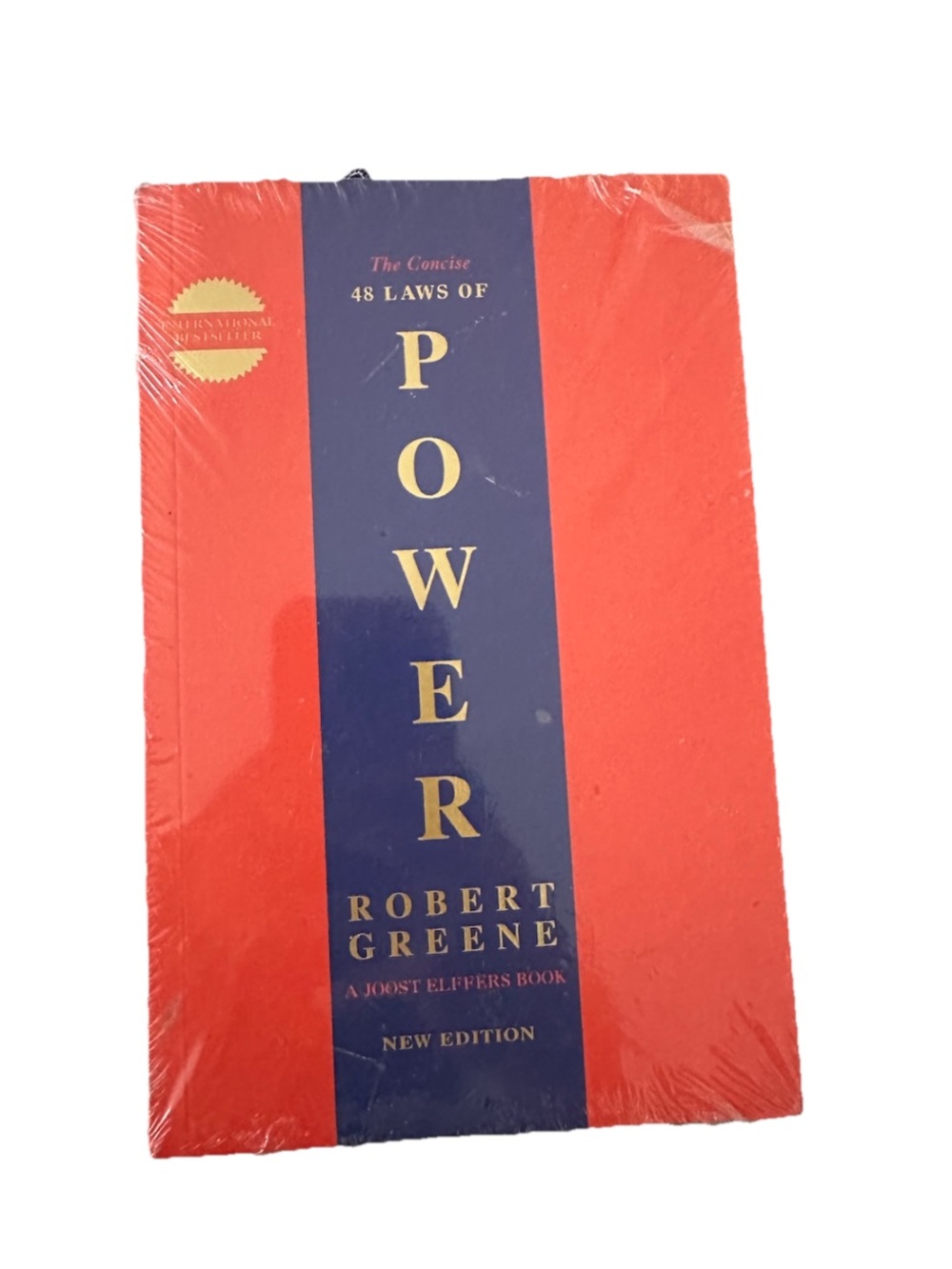The Concise 48 Laws of Power by Robert Greene - Red & Navy Cover